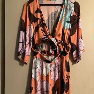 Becca cover up romper.